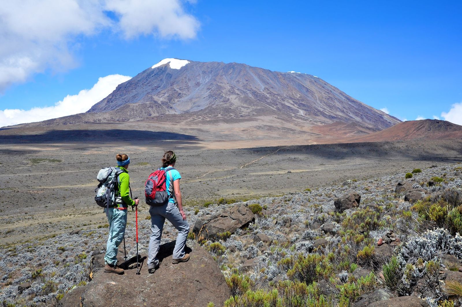 Hikers approach Mount Kilimanjaro